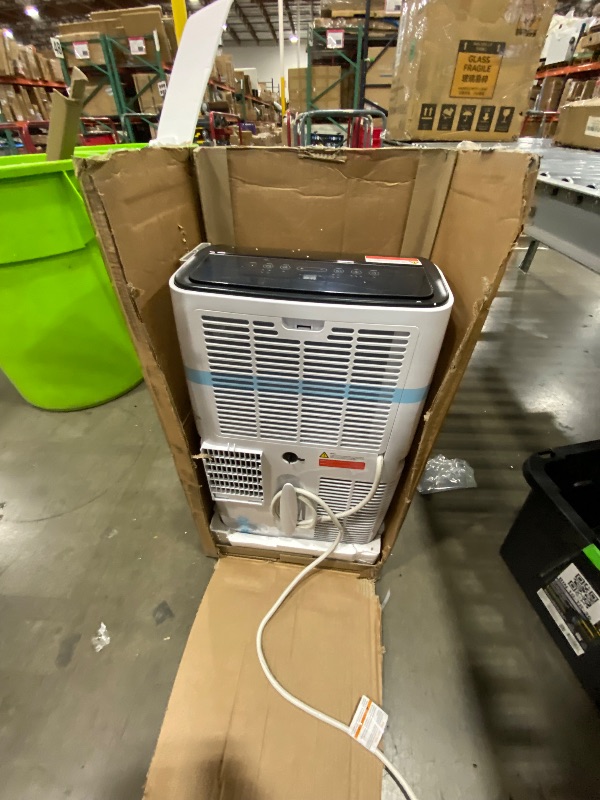 Photo 1 of **POWERCORD DAMAGE**GarveeTech 14,000 BTU Portable Air Conditioner