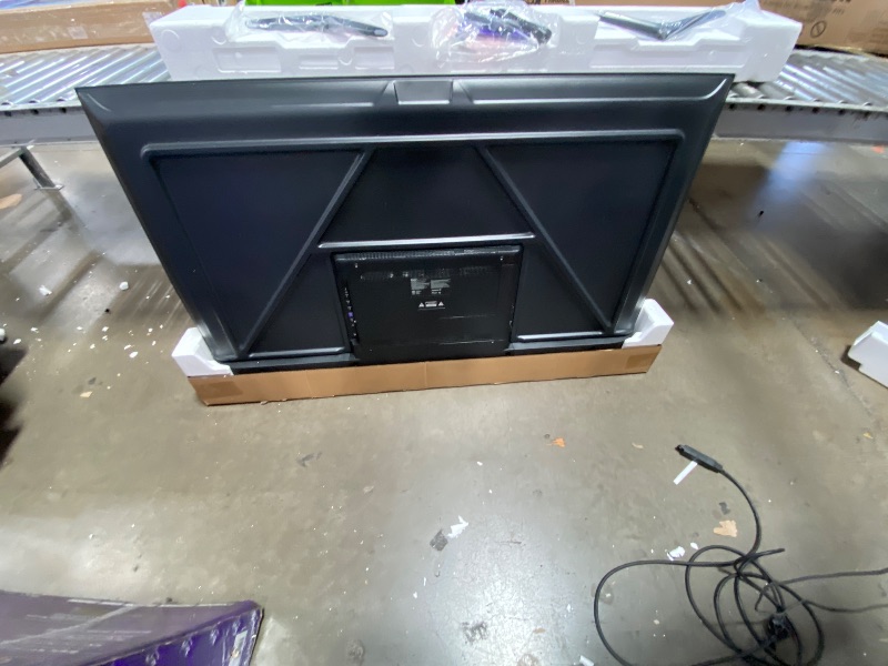 Photo 1 of **SEE PICTURES**Roku 65" QLED 4K Smart TV