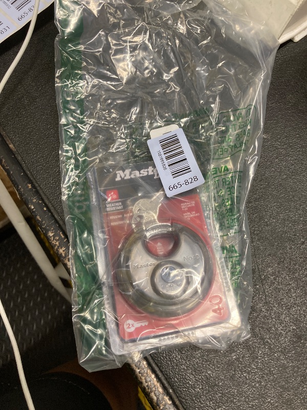 Photo 1 of ***Keys don't work***Master Lock Padlock, Stainless Steel Discus Lock, 2-3/4 in. Wide, 40DPF, Silver***Keys don't work***