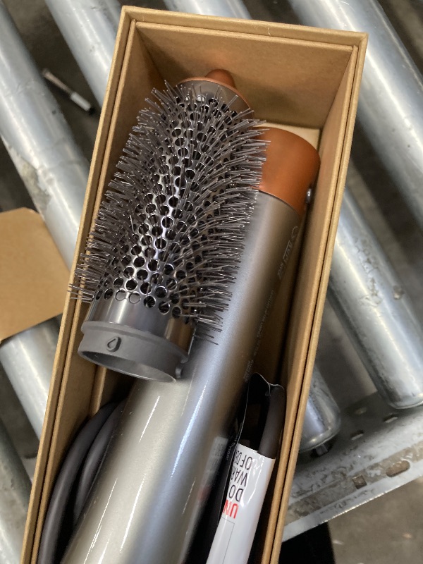 View 2 of **** no devolution It is used; it has a bit of hair on it, and when you turn it on, it smells like something burning.****Dyson Airwrap Origin Multi-Styler, No Heat Damage, 1.2" Barrel, Round Brush, Flyaway Attachment