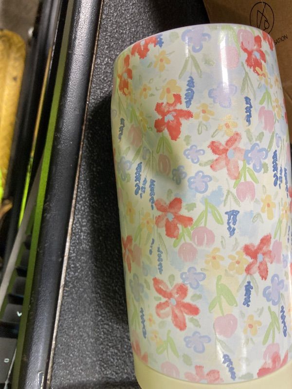 Photo 1 of ***DENTED***4-in-1 Skinny Can Cooler Double Wall Stainless Steel Insulated Can Holder,Can Coozie, Works With 12 Oz Slim Can,Standard Cans,Beer Bottles & As Pint Cups (Floral Pink)***DENTED***
