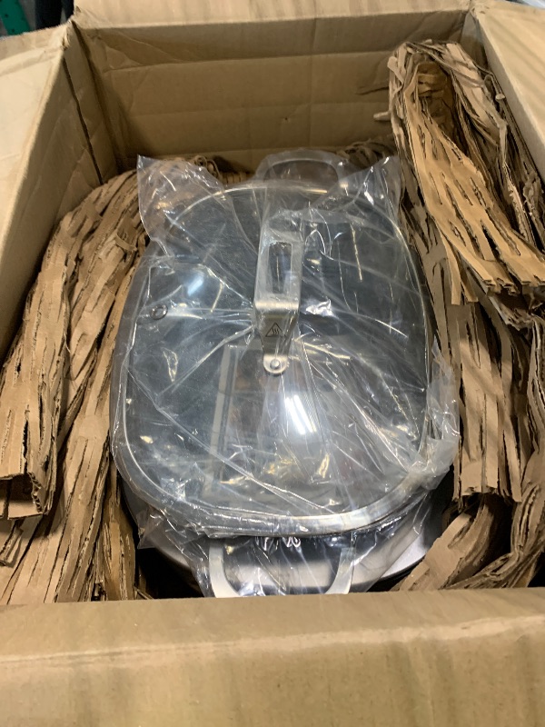 Photo 1 of *** dented on both sides **** Ninja® 14-in-1 PossibleCooker™ PRO | 8.5qt, Sous Vide, Proof, Bake, & Steam Multicooker | Slow Cooker, Dutch Oven | Glass Lid & Integrated Spoon | Nonstick, Oven Safe Pot 500°F | Sea Salt Gray |MC1001