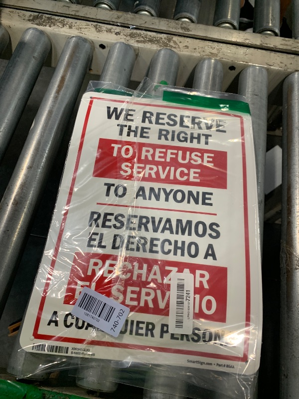 Photo 1 of "We Reserve The Right to Refuse Service to Anyone" Bilingual Sign by SmartSign | 10" x 14" Plastic
