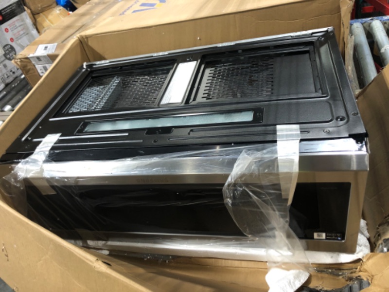 Photo 1 of ****MINOR DENT ON EDGE****
SAMSUNG 1.1 Cu Ft Smart SLIM Over the Range Microwave Oven w/ 550 CFM Hood Vent, Wi-Fi, Voice Control, LED Light Bar, Sensor Cook, 1100 Watt, ME11A7710DS/AA, Fingerprint Resistant Stainless Steel