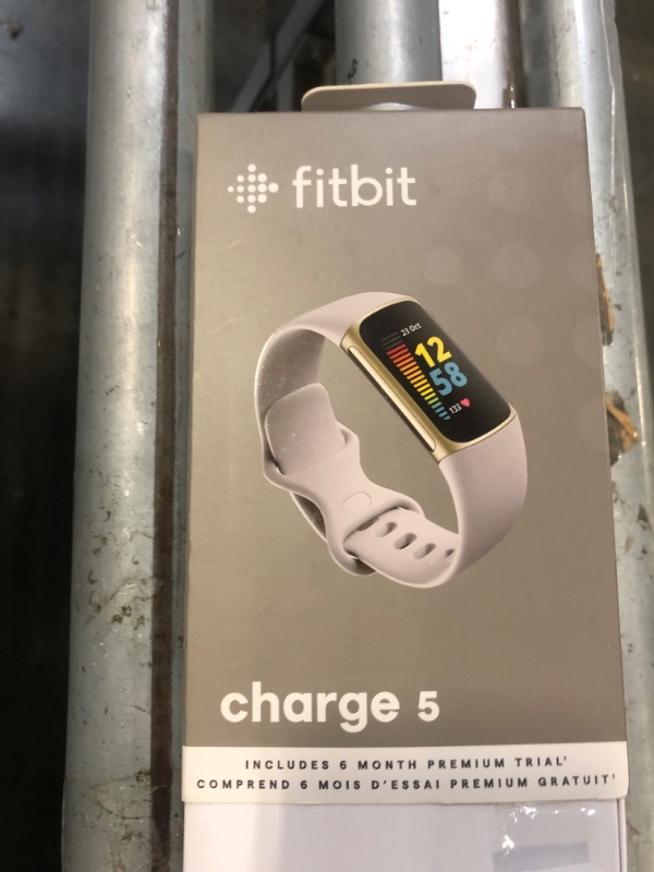 Photo 1 of ** ONLY WATCH ** Fitbit Charge 5 Advanced Fitness & Health Tracker (White) with Built-in GPS, Stress Management Tools, Bundle with 2 Watch Bands, 3.3foot Charge Cable, Wall Adapter, Screen Shield & PremGear for Fitbit