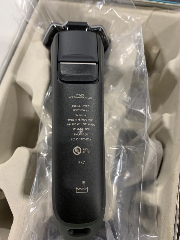 Photo 1 of Philips Norelco Shaver 7200, Rechargeable Wet & Dry Electric Shaver with SenseIQ Technology and Pop-up Trimmer, S7887/82