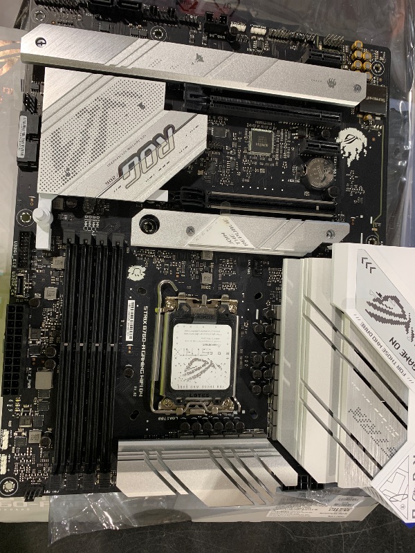 Photo 1 of ASUS ROG Strix B760-A Gaming WiFi D4 Intel B760 (13th and 12th Gen) LGA1700 white ATXmotherboard, 12+1 power stages, DDR4, PCIe 5.0, three M.2slots, WiFi 6E, USB 3.2 Gen 2x2 Type-C®, and Aura Sync RGB