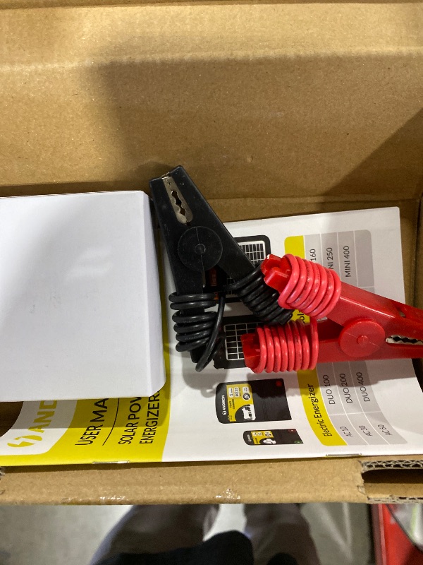 Photo 1 of ANDMON MINI400 30 Miles Solar Electric Fence Charger, 0.4 Joule Solar Electric Fence for Livestock, Horses, Cattle Sheep, Solar Fence Charger with Day or Night Mode, Easy Installation
