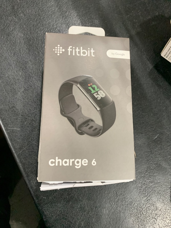 Photo 1 of Fitbit Charge 6 Fitness Tracker with Google Apps - Heart Rate on Exercise Equipment - 3-Month Google Health Premium Membership Included - Health Tools - Obsidian/Black - Small&Large Bands Included