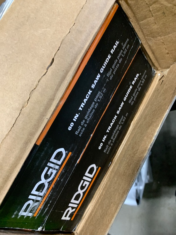 Photo 1 of RIDGID 60 in. Track Saw Guide Rail with 2 60 in. Tracks, 4 Connector Bars, and 2 TRA