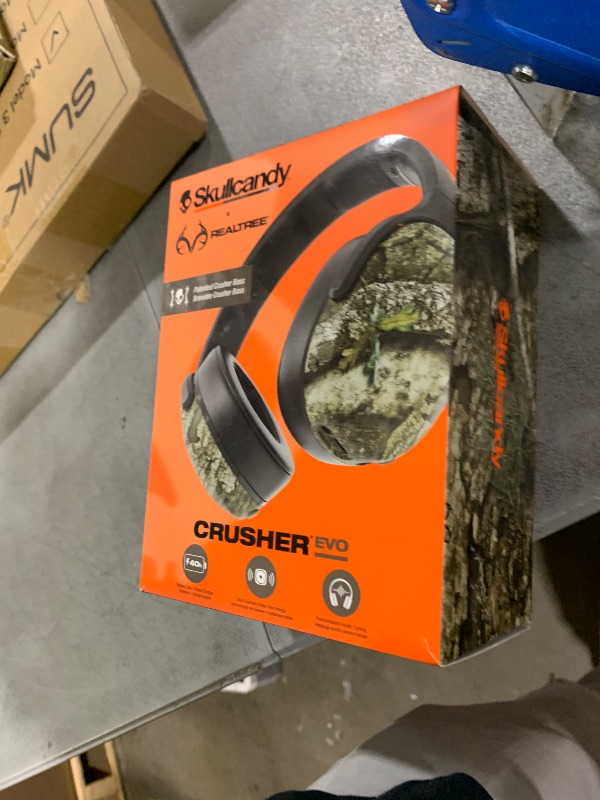 Photo 1 of Skullcandy Crusher Evo Wireless Bluetooth Headphones with Multi-Sensory Bass, Noise Isolating Over-Ear Fit, Up to 40 Hours Battery, Microphone for iPhone Android - Realtree APX Black/Orange