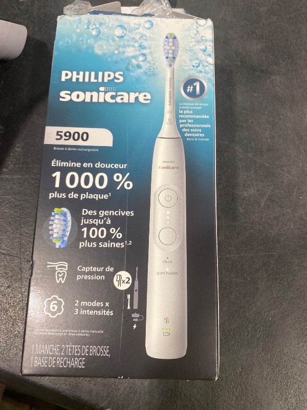 Photo 1 of Philips Sonicare 5900 Series Electric Toothbrush, Pressure Sensor, 6 Brushing Settings, SmarTimer, BrushPacer, 21-Day Runtime, Gentle Professional-Clean Feel, for Sensitive Gums, White, HX7130/02