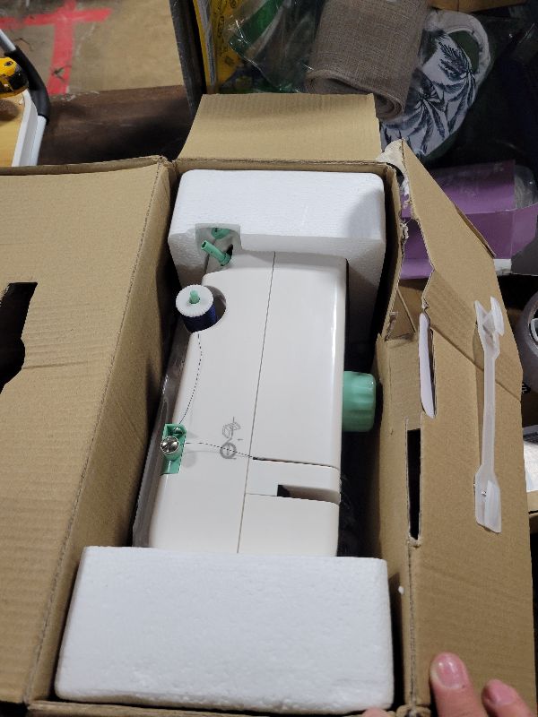 Photo 1 of 16 Strings of Weaving Dreams Sewing Machine117