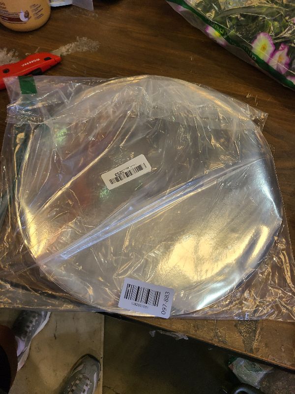 Photo 1 of 100 Pieces Silver Paper Placemats Round Disposable Glitter Table Mats Mirror Foil Decorative Place Mats for Wedding Holiday Party Christmas Dining Table Decor