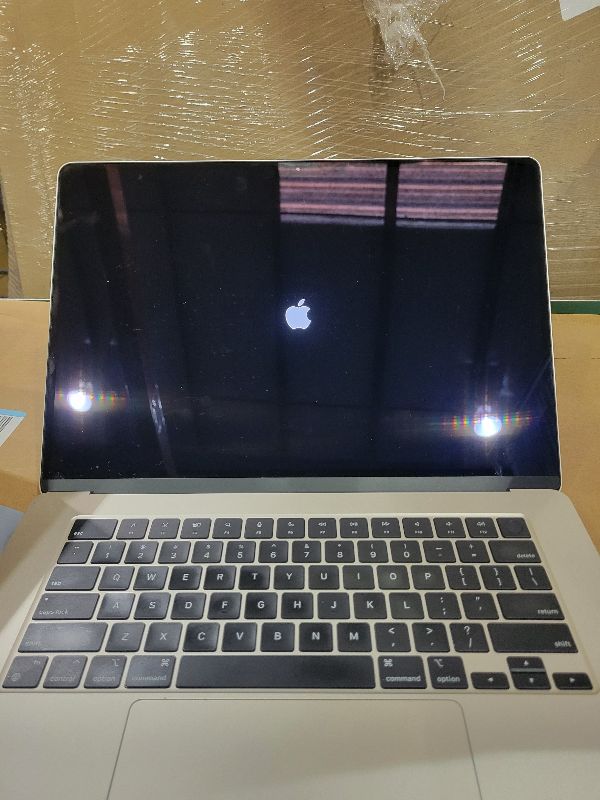 Photo 1 of 2023 Apple MacBook Air with Apple M2 Chip with 8-Core CPU/10-Core GPU (15-inch, 8GB RAM, 256GB SSD Storage) (QWERTY English) Starlight (Renewed)