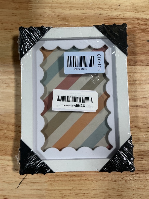 Photo 1 of **STYLE DIFFERS** THKRLOF 5x7 Picture Frame with Real Glass, Wooden cute 5 x 7 Photo Frame with Wavy Mat for Tabletop and Wall Hanging, White, 1 Pack