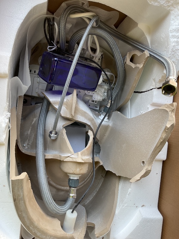 Photo 1 of **SELLING FOR PARTS.  Major damage to base. Most of  broken loose ceramic removed**EPLO Luxury Smart Toilet with Auto Open/Close, Foam Dispenser, ADA Comfort Height Heated Seat, Warm Water/Dryer, Modern Elongated Bidet Toilet with Night Light for Bathroom