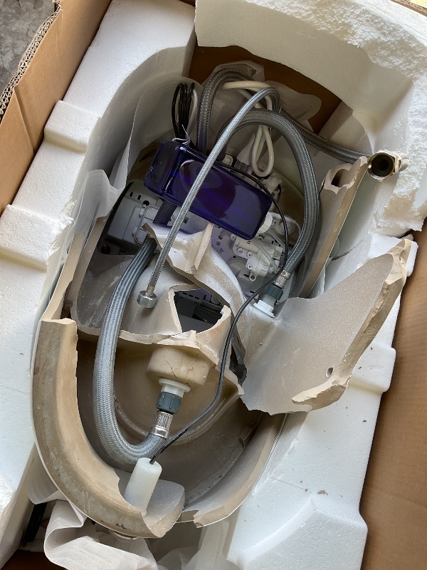 Photo 1 of **SELLING FOR PARTS.  Major damage to base. Most of  broken loose ceramic removed**EPLO Luxury Smart Toilet with Auto Open/Close, Foam Dispenser, ADA Comfort Height Heated Seat, Warm Water/Dryer, Modern Elongated Bidet Toilet with Night Light for Bathroom