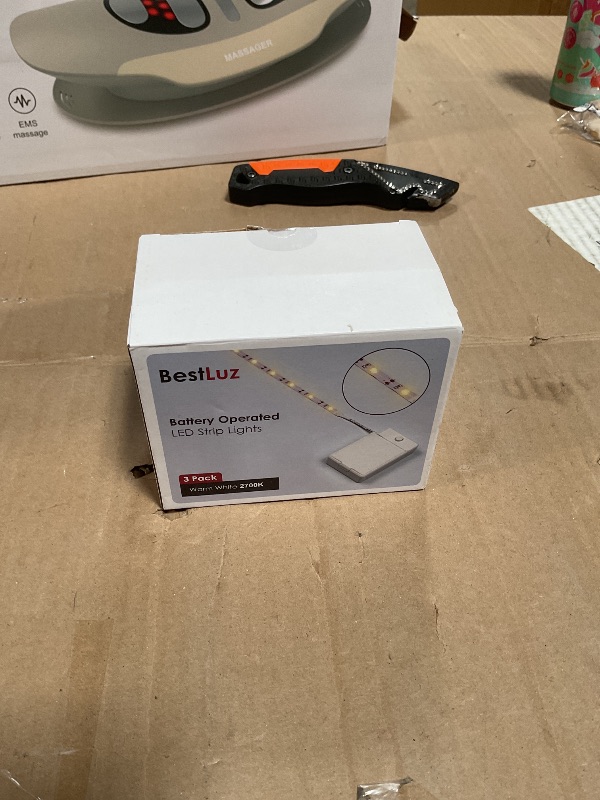 Photo 1 of **MINOR DAMAGE TO STRIP *** BestLuz Battery Powered LED Strip Lights, 3 Pack 40 Inch Battery Operated LED Strip Lights for Shelves and Under Cabinet Indoor Use, Cordless LED Light Strips Warm White 2700K