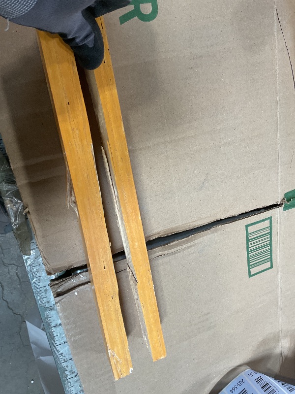 Photo 1 of ** MAJOR DAMAGE TO ONE BIG PIECE. SELLING FOR PARTS.**Wooden bed frame. Size unknown.