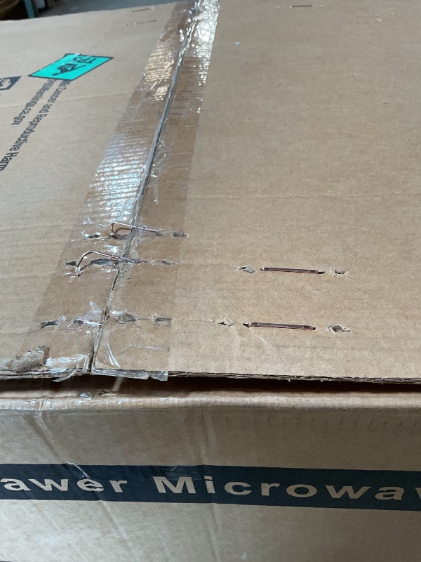 Photo 1 of **DENT**THOR Kitchen Professional 24-Inch Microwave Drawer - Model TMD2401