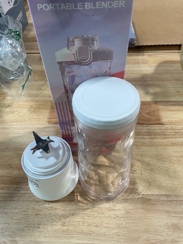 Photo 1 of ***MISSING ASSEMBLY PIECES*** SEAINS Portable Blender with 20 Oz Travel Cup, 6 Blades, USB Rechargeable for Shakes, Smoothies, Gym, Kitchen and Outdoors (White)