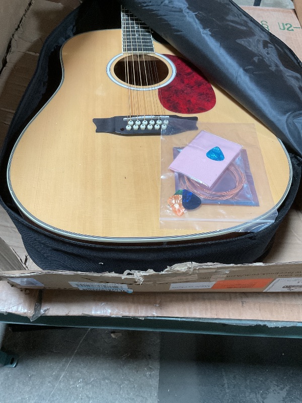 Photo 1 of ***DAMAGED CRACK ON FRONT AND BACK***
Asmuse 12 String Guitar?42" Full Size Acoustic Electric Guitar,Bundle with 4-Band EQ, Gig Bag, Picks, Shoulder Strap?Six extra strings?Beginner Electric Guitar Kit for Adults and Students