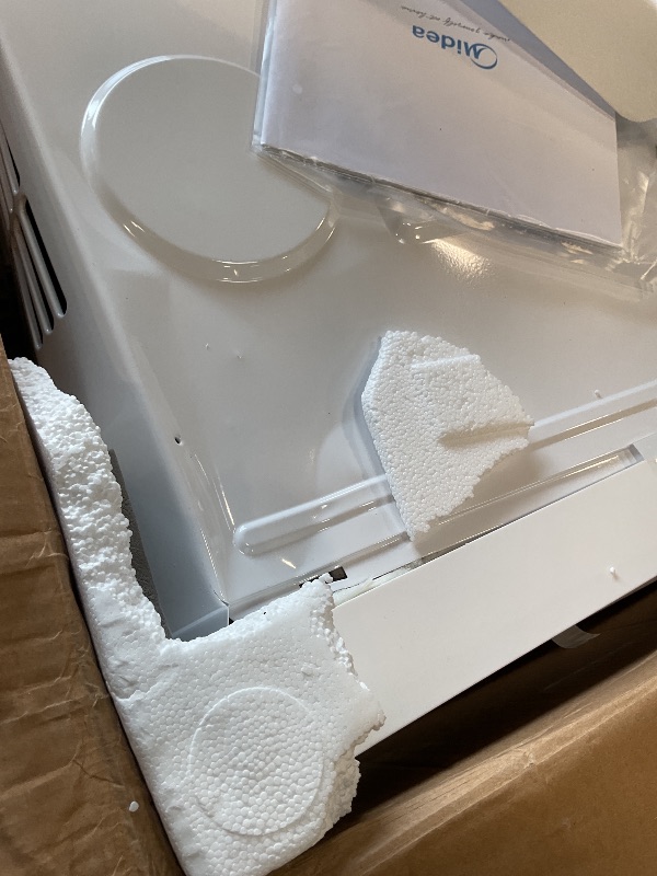 Photo 1 of ** DENT DAMAGE/FRONT FRAME IS COMING LOOSE**Midea 10,000 BTU Smart Inverter Window Air Conditioner with APP, Alexa Control, 115V AC Unit Cools up to 450 Sq. Ft, Quiet Operation, Energy Saving, Remote & Easy Installation Kit, White