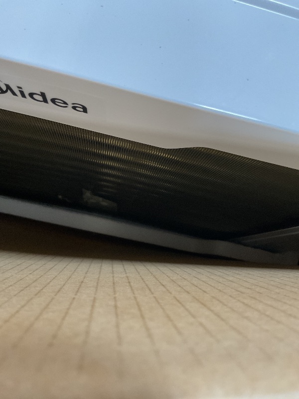 Photo 1 of **DENT DAMAGE**Midea Inverter Window Air Conditioner with Heat – Quiet Window AC Unit and Heat Combo with Dehumidifier – Cools up to 550 Sq. Ft. – Energy Star Rated, Smart Control, Remote, 12,000 BTU