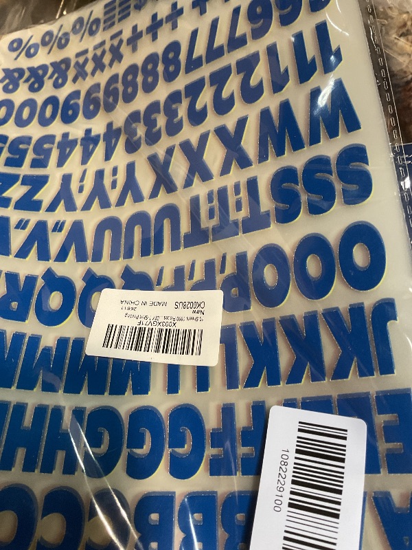 Photo 1 of 10 Sheets 1660 Pieces Iron on Letters and Numbers, 1 Inch 5 Colors Vinyl Letters with A-Z Heat Transfer Letters 0-9 PU Iron on Numbers for Clothing T-Shirt DIY Crafts (Black, White, Yellow, Red, Blue)