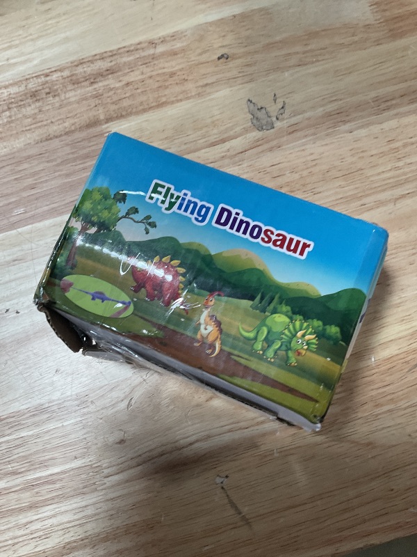 Photo 1 of 20 Pcs Slingshot Dinosaur Finger Toys, Flying Dinosaur Party Favors for Kids, Sticky Rubber Dino Fidget Toys, Funny Gag Gifts Treasure Box Classroom Prizes for Boys Girls