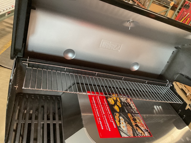 Photo 1 of **DIRT/SCRATCHES**Genesis E-415 4-Burner Liquid Propane Gas Grill in Black with Side Tables