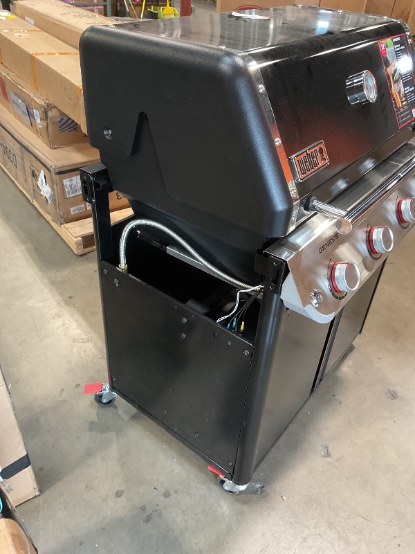 Photo 1 of **DIRT/SCRATCHES**Genesis E-415 4-Burner Liquid Propane Gas Grill in Black with Side Tables