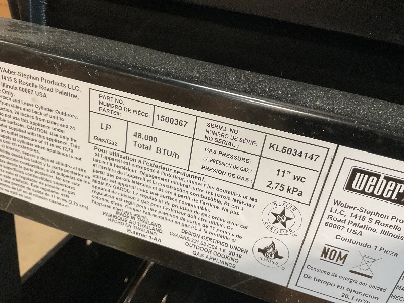 Photo 1 of **DIRT/SCRATCHES**Genesis E-415 4-Burner Liquid Propane Gas Grill in Black with Side Tables