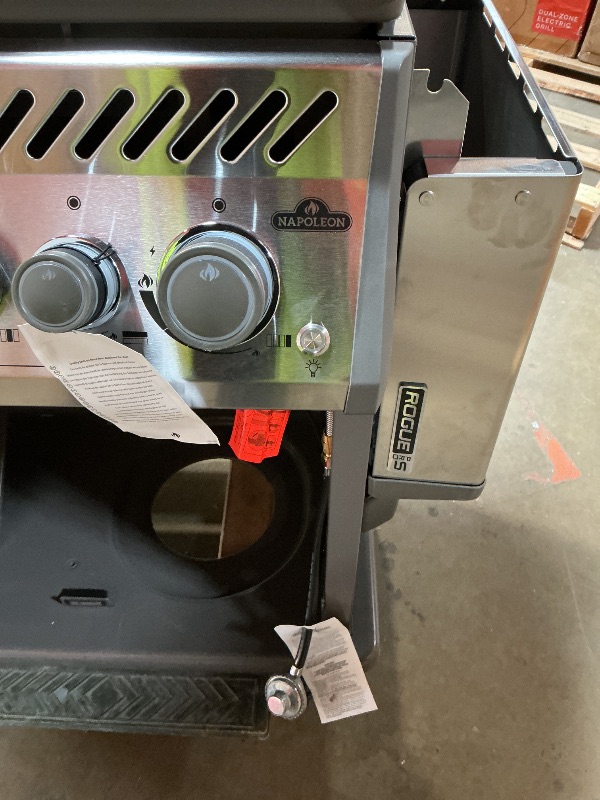 Photo 1 of ** DIRT/SCRATCHES/DENTS. MISSING ONE WHEEL**Napoleon Rogue PRO-S 525 Propane Gas Grill with Infrared Side and Rear Burners, Stainless Steel, Durable 6-Burner BBQ