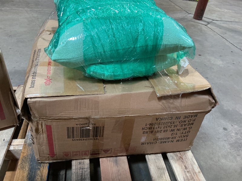 Photo 1 of **2 BOXES**One pair of beige chairs.
