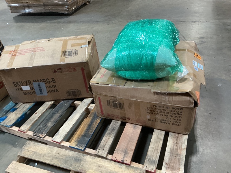 Photo 1 of **2 BOXES**One pair of beige chairs.