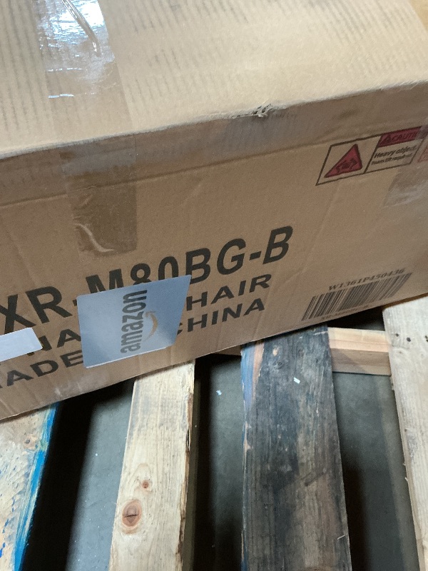 Photo 1 of **2 BOXES**One pair of beige chairs.