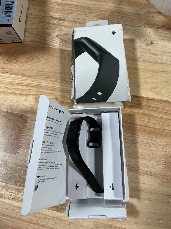 Photo 1 of **MISSING HALF OF THE WATCH BAND*** Fitbit Charge 6 Fitness Tracker with Google Apps - Heart Rate on Exercise Equipment - 3-Month Google Health Premium Membership Included - Health Tools - Obsidian/Black - Small&Large Bands Included