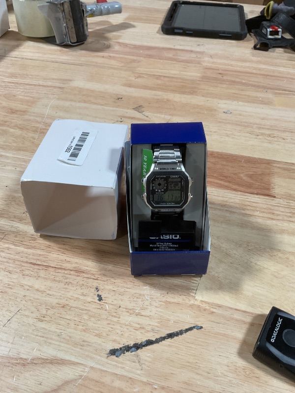 Photo 1 of ** FOR PARTS/ BUTTONS NON-FUNCTIONAL***Casio Men's Classic Stainless Steel Japanese-Quartz Stainless-Steel Strap, Silver, 21 Casual Watch (Model: AE1200WHD-1A)