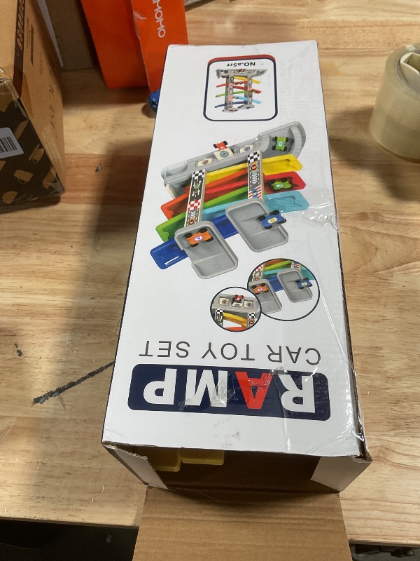 Photo 1 of ** RECOMENDED FOR PARTS/ MISSING ASSEMBLY PIECES ONLY HAS 1 CAR*** Montessori Toys for 2 3 Year Old Boys Toddlers, Car Ramp Toys with 6 Cars & Race Tracks, Garages and Parking Lots, Ramp Racer Toy Gift for Boys Girls Age 18 Months and Up, Multicolor