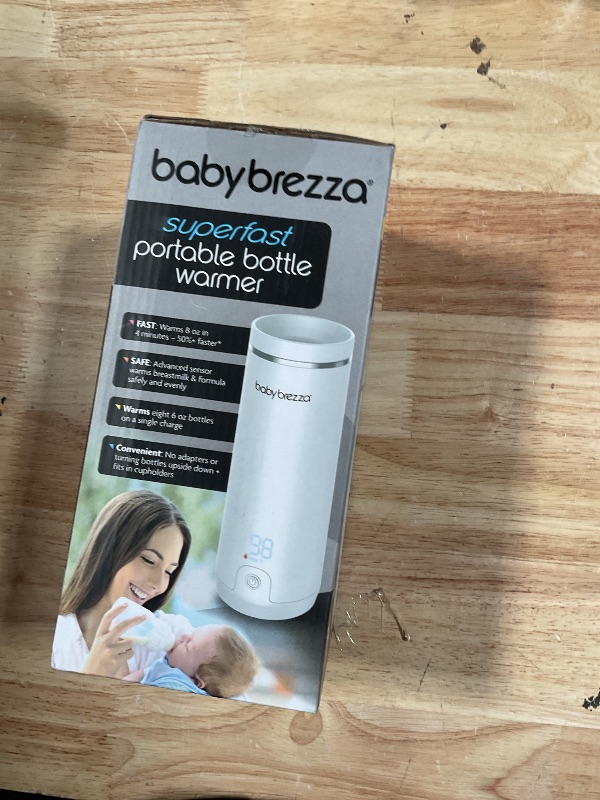 Photo 1 of **FOR PARTS/ NON-FUNCTIONAL*** Baby Brezza Portable Warmer – 3X Faster Baby Bottle Warming - Travel Breastmilk and Formula Warmer - Safe, Even Heating - Up to 9oz - No Adapters, White