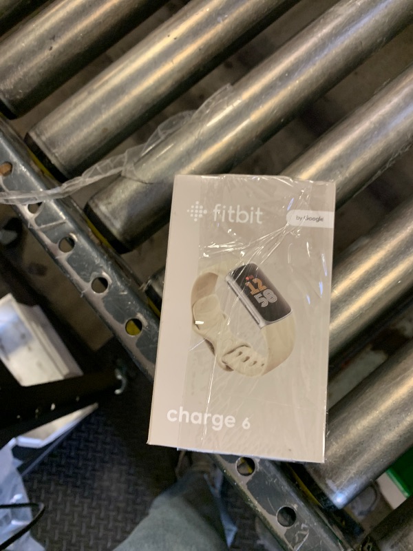 Photo 1 of Fitbit Charge 6 Fitness Tracker with Google Apps - Heart Rate on Exercise Equipment - 3-Month Google Health Premium Membership Included - Health Tools - Porcelain/Silver - Small&Large Bands Included