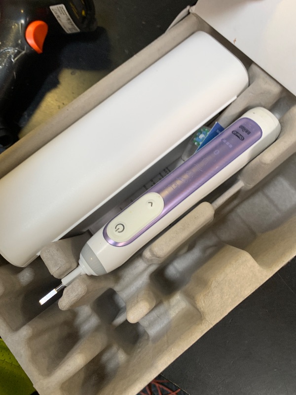 Photo 1 of Oral-B Genius X Limited Rechargeable Electric Toothbrush with 1 Replacement Brush Head, Travel Case, White