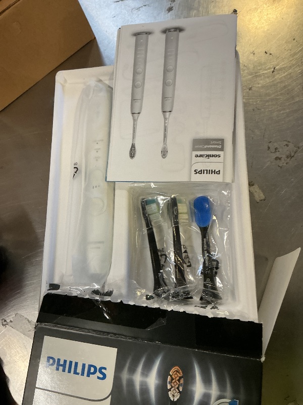 Photo 1 of Philips Sonicare DiamondClean Smart 9500 Electric Toothbrush - Sonic Toothbrush with App, Pressure Sensor, 15 Brushing Settings, Replacement Reminder, USB Charging Travel Case, Black, Model HX9923/11