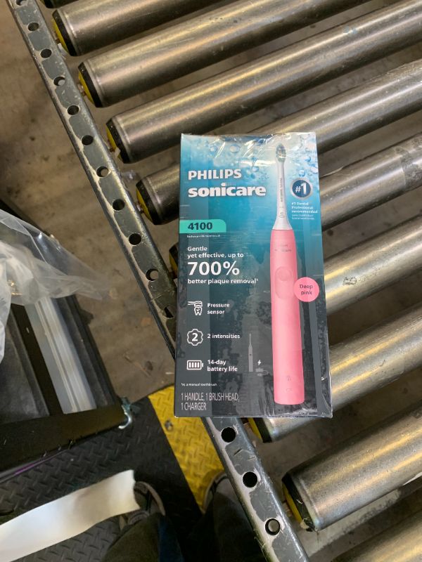 Photo 1 of Philips Sonicare 4100 Series Electric Toothbrush - Sonic Toothbrush with Advanced Sonic Technology, Pressure Sensor, Two Intensity Settings, Smartimer & Quadpacer, Deep Pink, Model HX3681/26