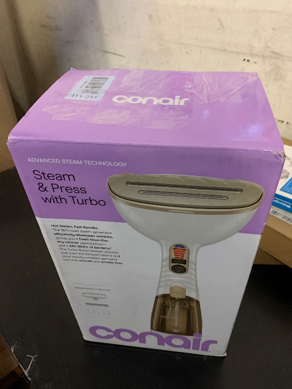 Photo 1 of Conair Handheld Garment Steamer for Clothes, Turbo ExtremeSteam 1875W Fabric Steamer, Portable Handheld Design, Strong Penetrating Steam, White/Champagne