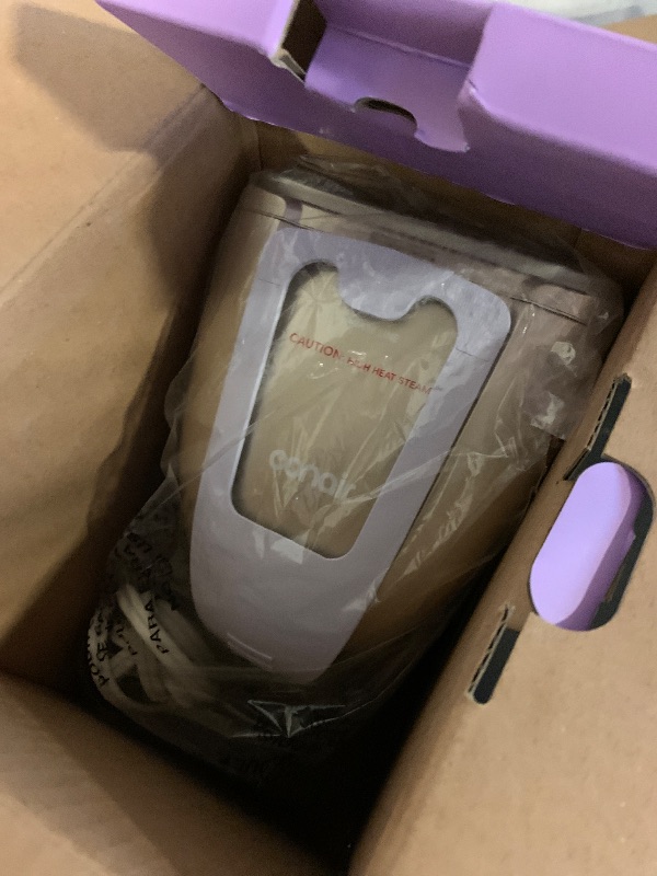Photo 1 of Conair Handheld Garment Steamer for Clothes, Turbo ExtremeSteam 1875W Fabric Steamer, Portable Handheld Design, Strong Penetrating Steam, White/Champagne