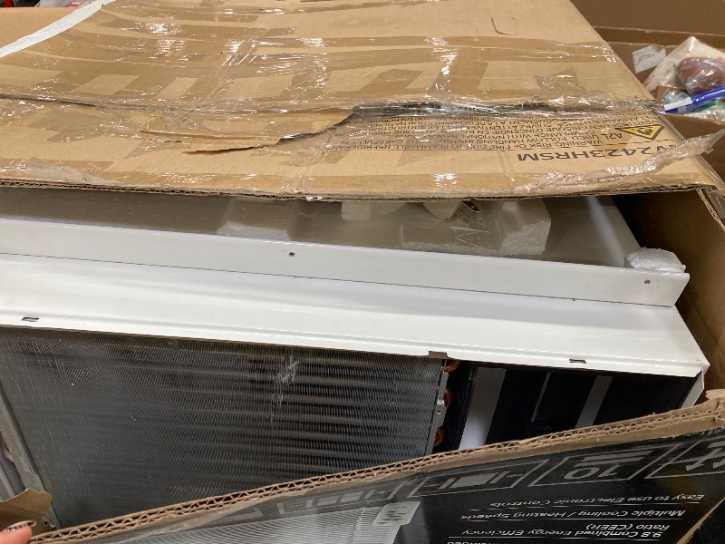 Photo 1 of ***DAMAGED -SELLING AS IS *** LG 23,000 BTU Smart Window Air Conditioner with Heat, 230V, Air Conditioner Cools Rooms up to 1,400 Sq.Ft., Smartphone & Voice Control works with Remote, White