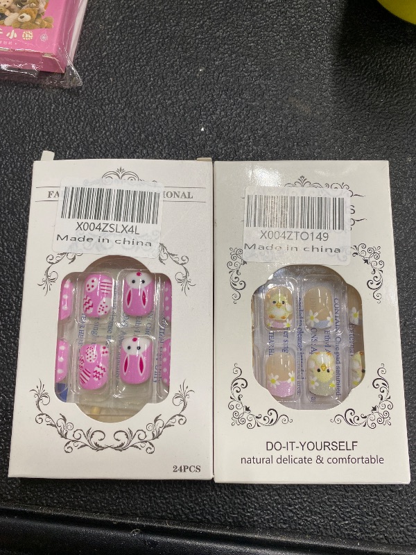 Photo 1 of **2 DIFFERENT PACKS OF EASTER NAILS**24Pcs Pink Square Press on Nails Easter Fake Nails with Colorful Eggs Bunny Design Holiday Reusable Stick on Nails Cute Easter Bunny Nail Artificial Short Nails Press ons Spring Summer Nail for Women